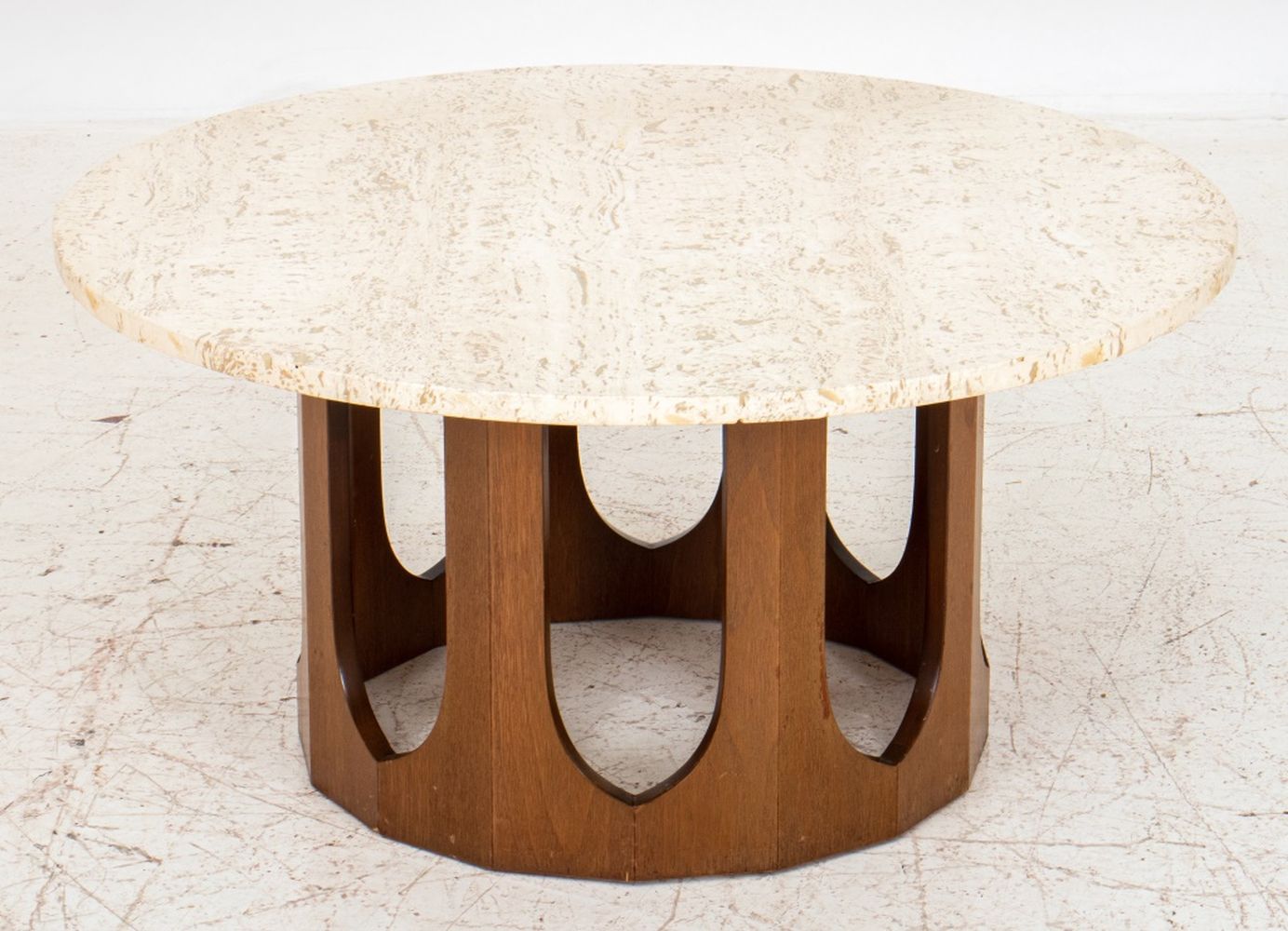 Appraisal: HARVEY PROBBER TRAVERTINE ROUND COFFEE TABLE Harvey Probber travertine round