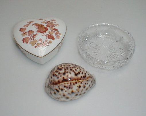 Appraisal: A crystal pin tray Wedgwood trinket box and a conch