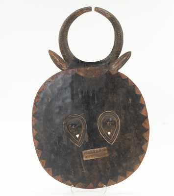 Appraisal: A Large Ceremonial Dance Sheild Round plank with face zig