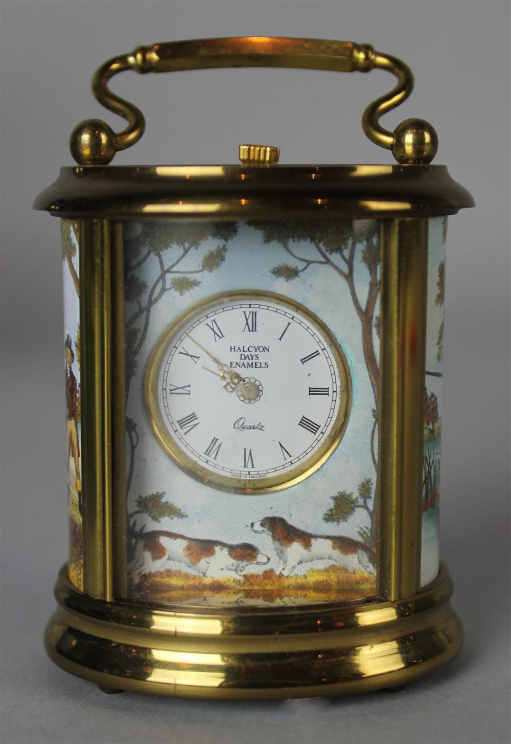 Appraisal: HALCYON DAYS GILT METAL ENAMEL MINIATURE CARRIAGE CLOCK for James