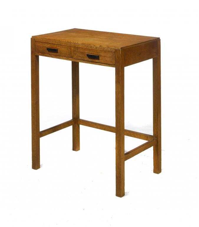 Appraisal: A COTSWOLD SCHOOL OAK SIDE TABLE fitted with two drawers