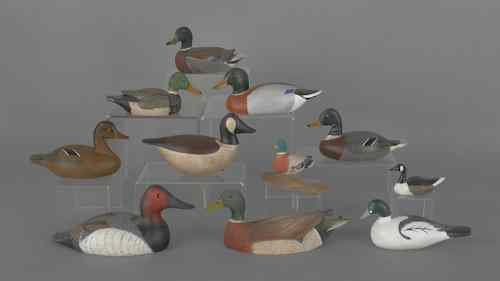 Appraisal: Group of eleven miniature contemporary carved and painted duck decoys