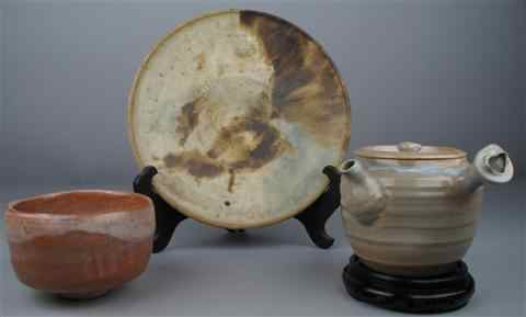 Appraisal: TWO PIECES OF JAPANESE POTTERY including a teabowl covered in