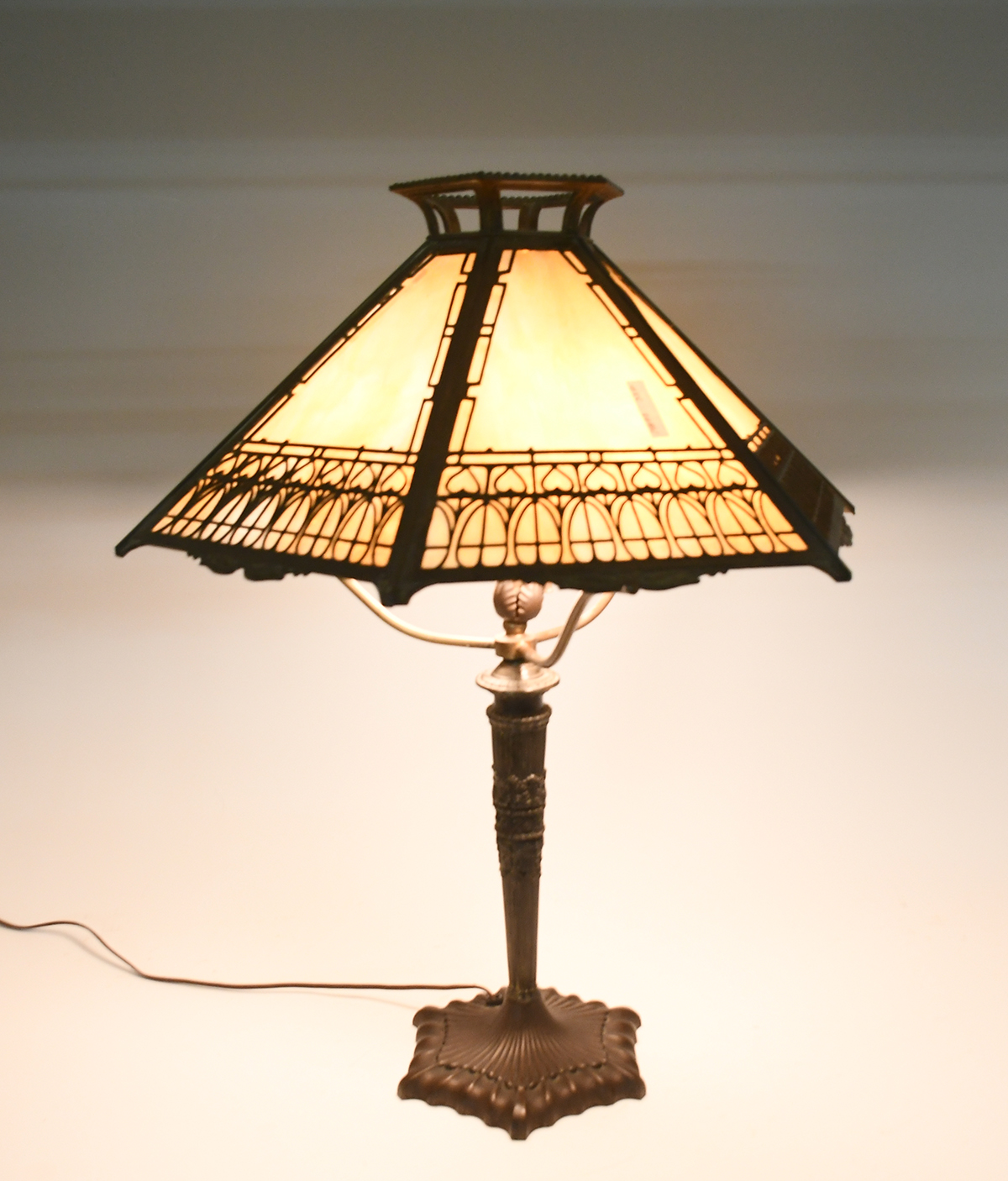 Appraisal: FILIGREE SLAG GLASS TABLE LAMP Hexagonal filigree shade with caramel