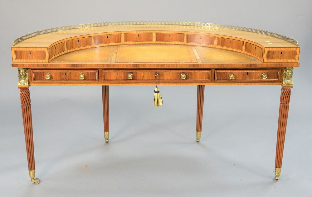 Appraisal: William Tillman half-round desk having three section inset leather and