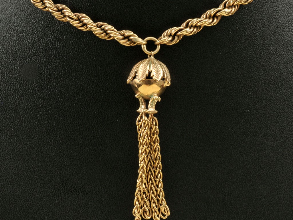 Appraisal: A ct gold rope twist Necklace with tassel fob approx