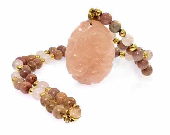 Appraisal: A Carved Rose Quartz Pendant and Bead Necklace consisting of