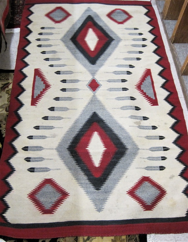 Appraisal: NAVAJO AREA RUG hand woven in a double serrated diamond