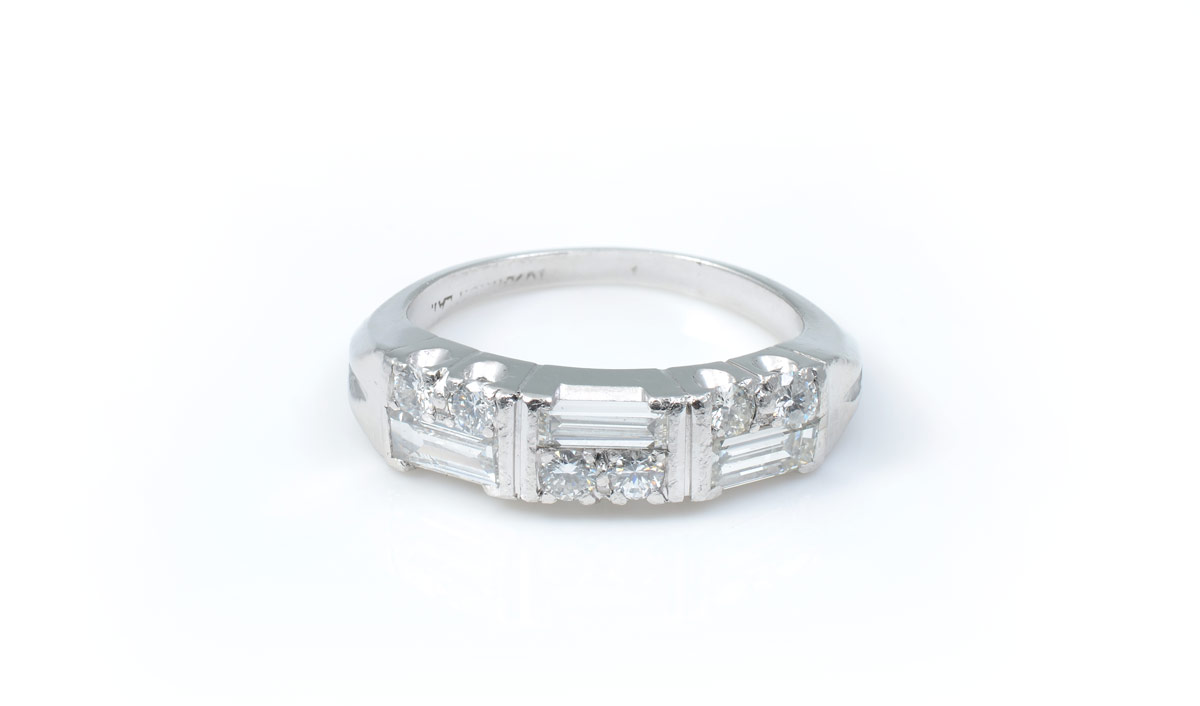 Appraisal: PLATINUM ART DECO STYLE DIAMOND RING Six round brilliant and