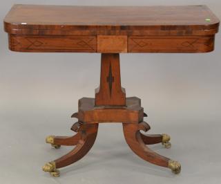 Appraisal: George III mahogany game table having banded and brass inlaid