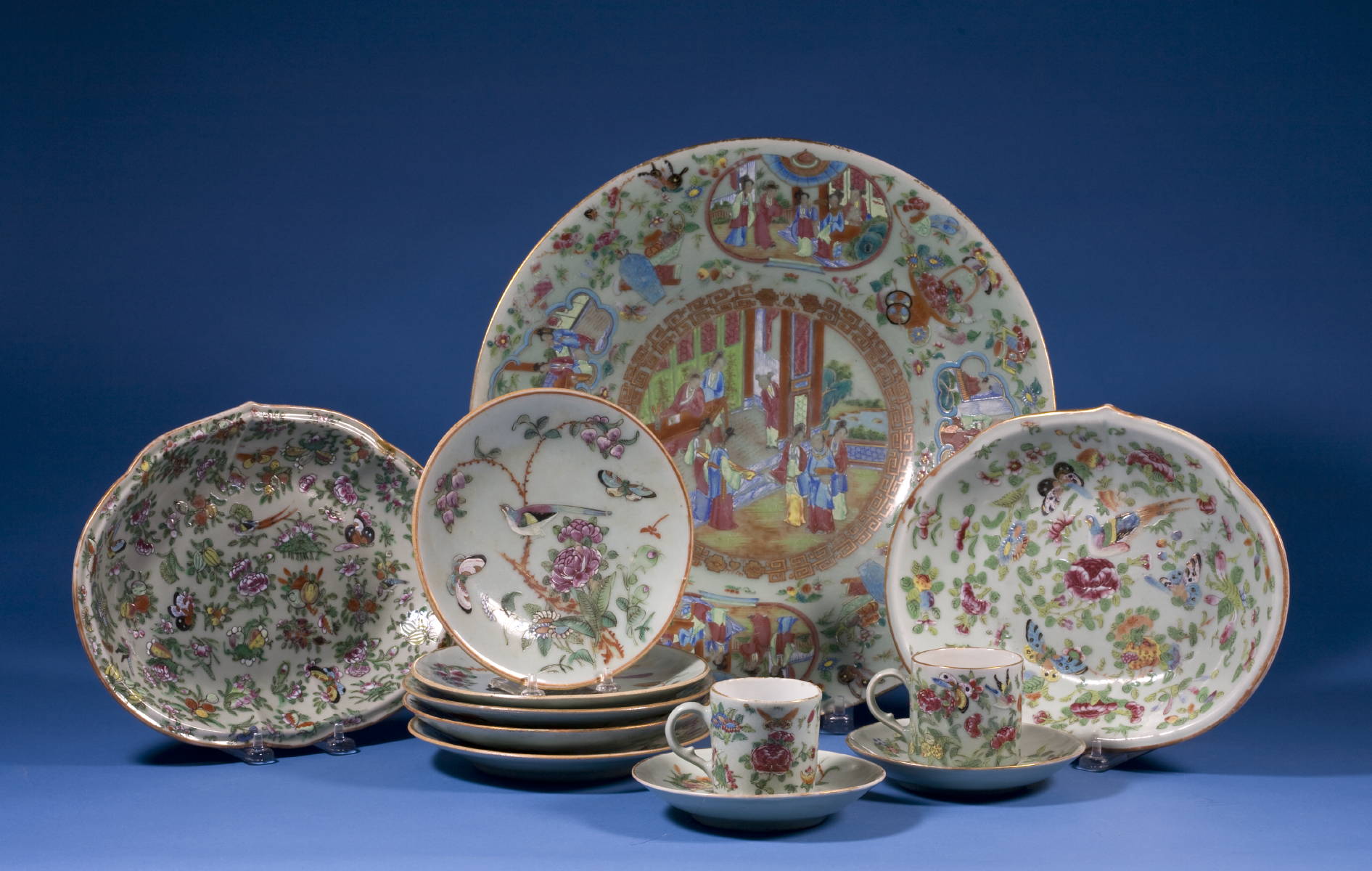 Appraisal: CHINESE EXPORT PORCELAIN CELADON TABLEWARES INCLUDING A FOOTED CHARGER TWO