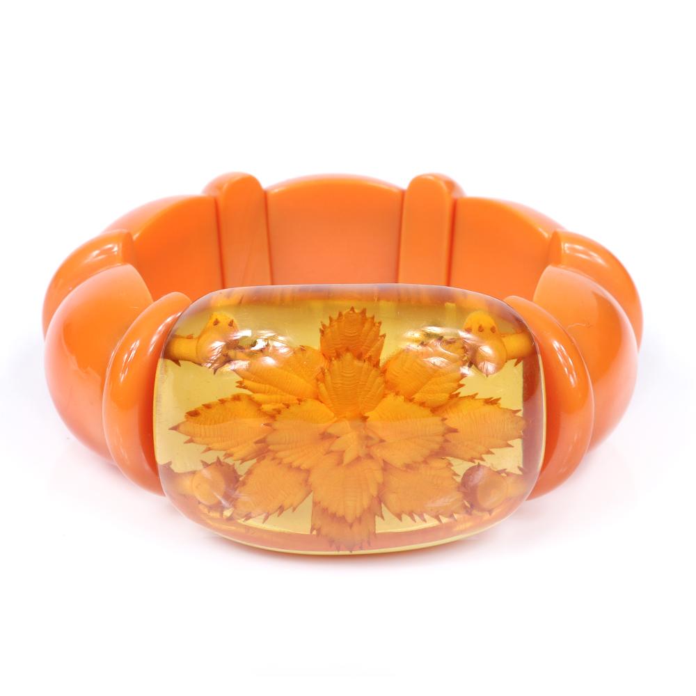 Appraisal: VINTAGE BAKELITE STRETCH BRACELET WITH TANGERINE WEDGE AND LINE SPACERS