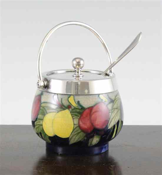 Appraisal: A Moorcroft 'Plum' pattern preserve jar early th century decorated