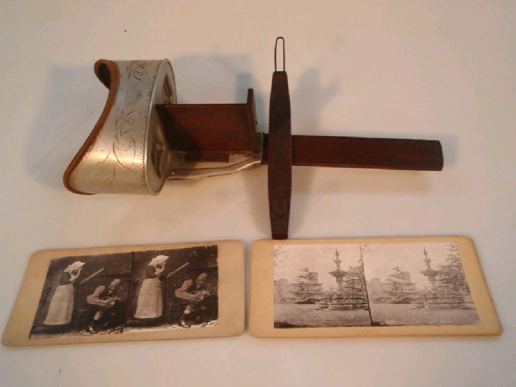 Appraisal: A Victorian stereoscopic viewer and a quantity of cards