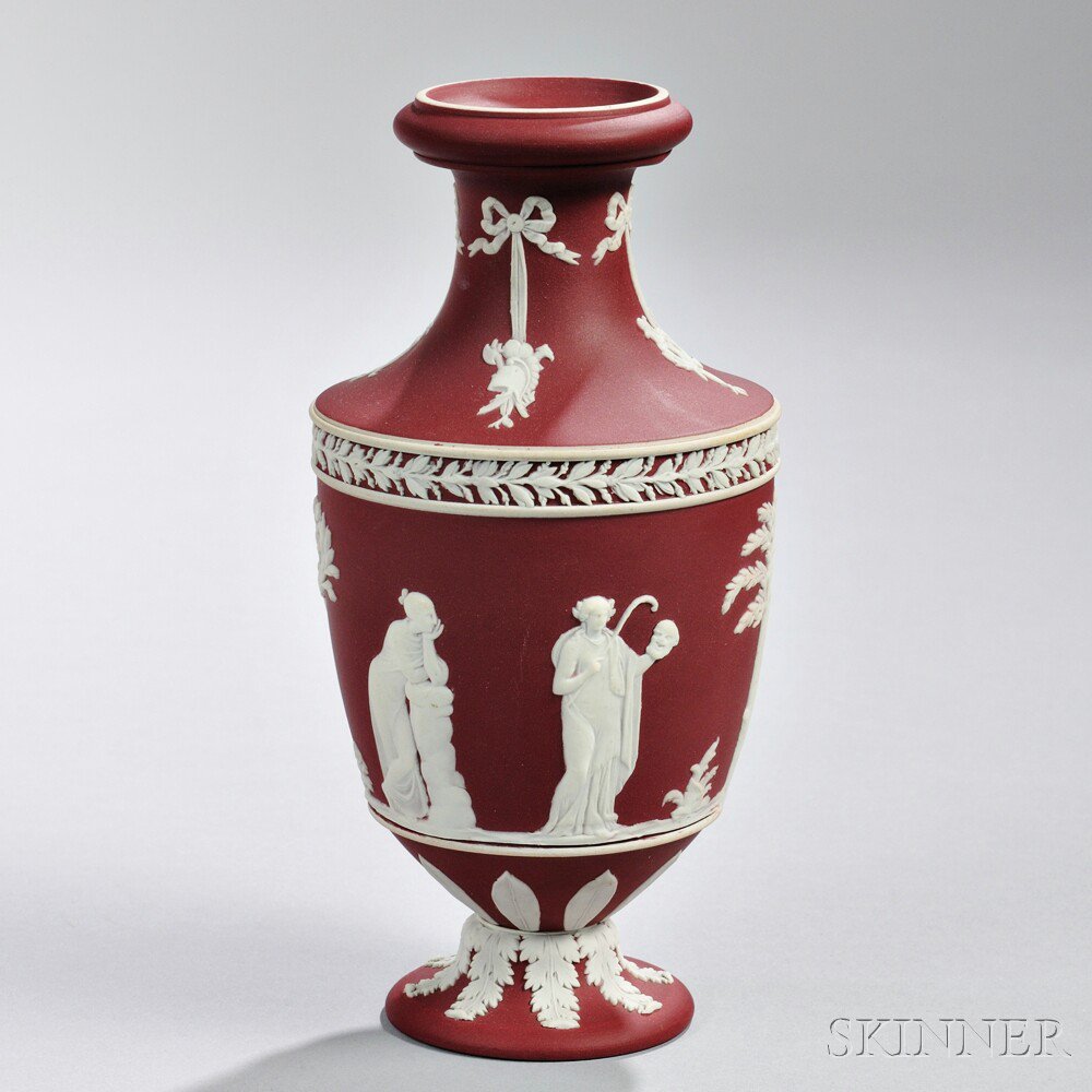 Appraisal: Wedgwood Crimson Jasper Dip Vase England c applied white trophies