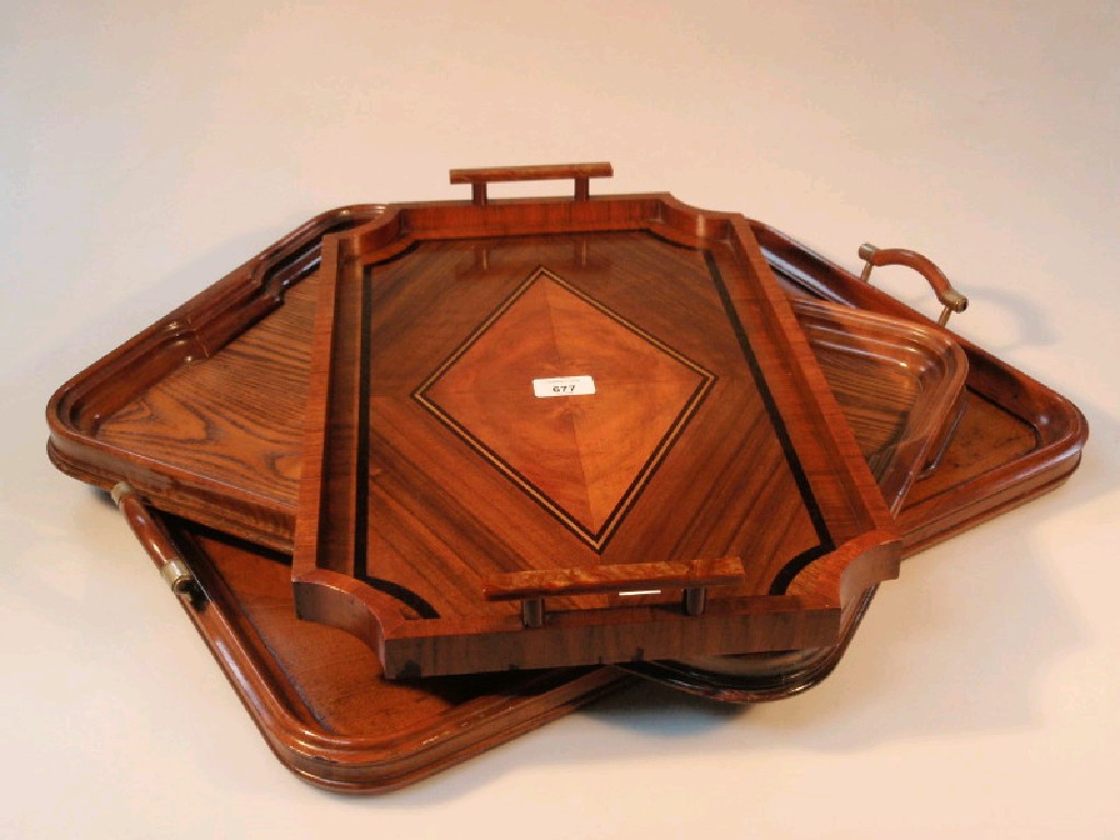 Appraisal: Three wooden serving trays including an Art Deco marquetry example