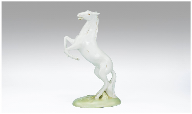 Appraisal: Royal Dux Rearing Horse On light green and gilt base