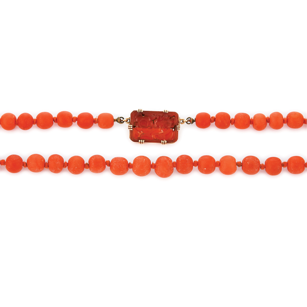 Appraisal: Gold and Coral Bead Necklace with Carved Carnelian Clasp kt