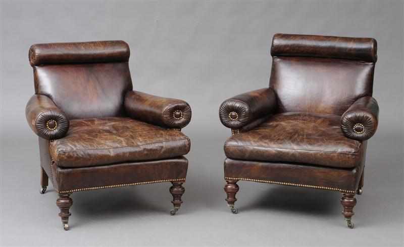 Appraisal: PAIR OF ENGLISH BROWN LEATHER-UPHOLSTERED ARMCHAIRS With tubular top rails