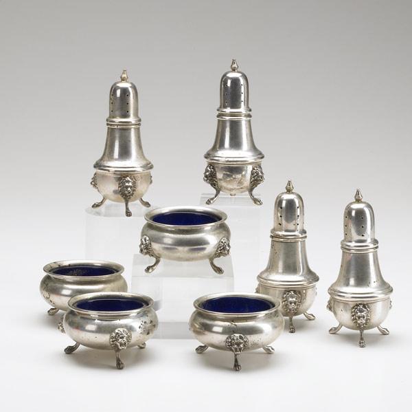 Appraisal: POOLE STERLING Salt cellars with cobalt liners and pepperettes on