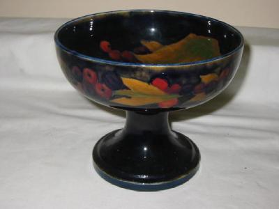 Appraisal: A WILLIAM MOORCROFT POTTERY COMPORT of circular form tube lined