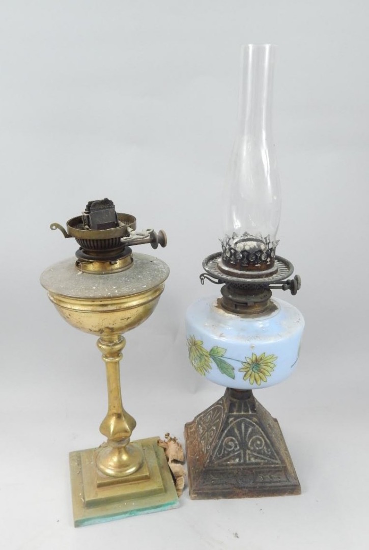 Appraisal: Two late thC oil lamps to include an example with