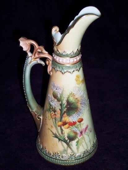 Appraisal: A Royal Worcester ewer finely painted summer flowers on an