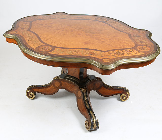 Appraisal: AN EARLY VICTORIAN IRISH SERPENTINE TOPPED CENTRE TABLE by J