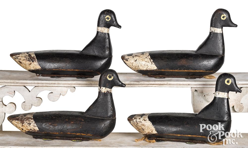 Appraisal: Rig of four carved and painted duck decoys Rig of