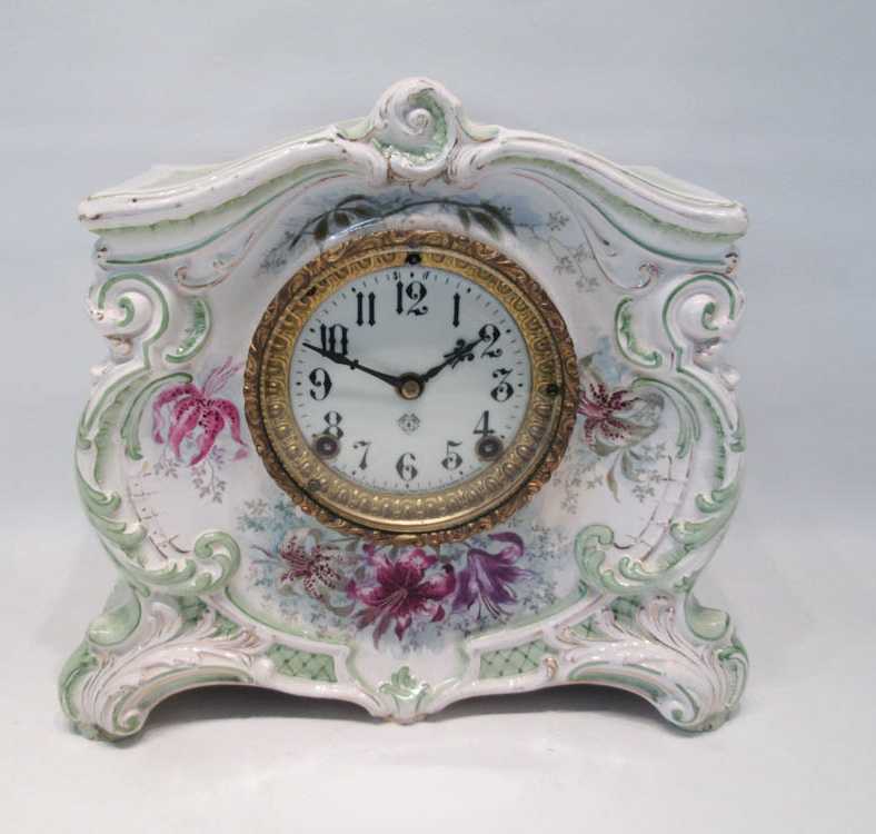 Appraisal: ANSONIA AND ROYAL BONN PORCELAIN MANTLE CLOCK The floral decorated