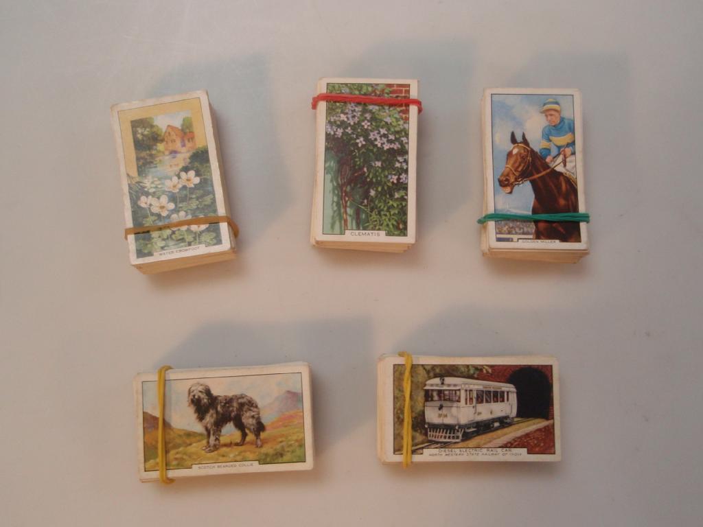 Appraisal: Five full sets of Gallaher cigarette cards Trains of the