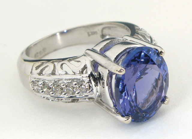 Appraisal: TANZANITE AND DIAMOND RING with appraisal The k white gold