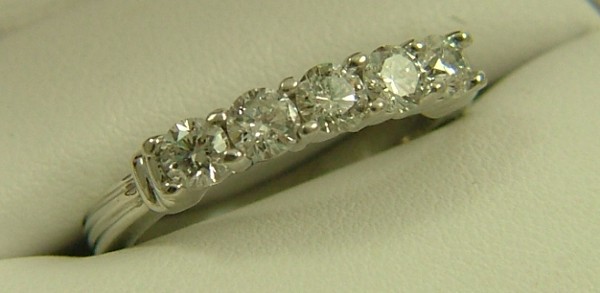 Appraisal: FIVE-DIAMOND RING platinum setting estimated total weight of diamonds ct