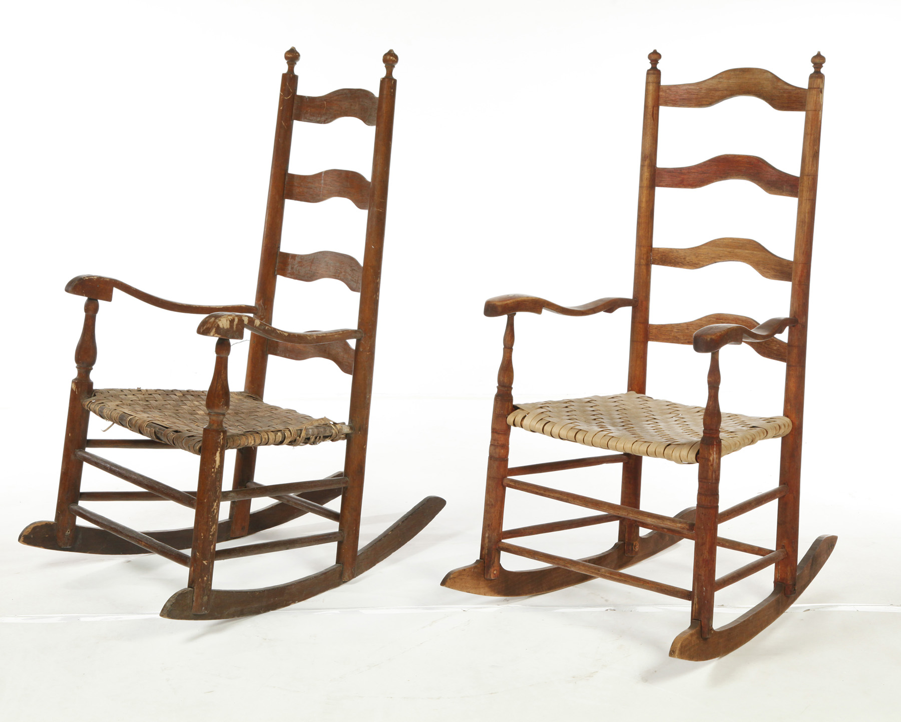 Appraisal: TWO OHIO LADDERBACK ROCKING CHAIRS Attributed to Belmont County early