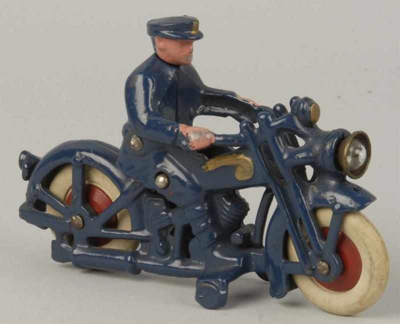 Appraisal: Cast Iron Hubley Motorcycle Toy Description Blue cast-on policeman driver