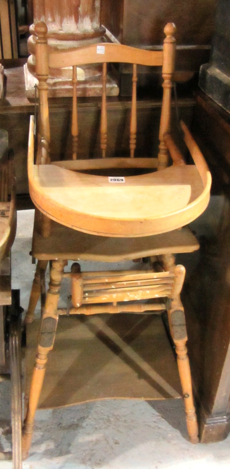 Appraisal: A th century beech child's stick back high chair