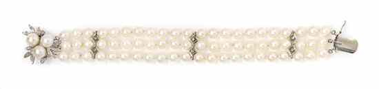 Appraisal: A Three Strand Cultured Pearl and Diamond Bracelet consisting of