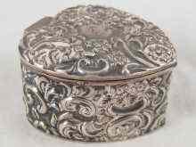 Appraisal: An embossed silver heart shaped trinket box William Davenport Birmingham