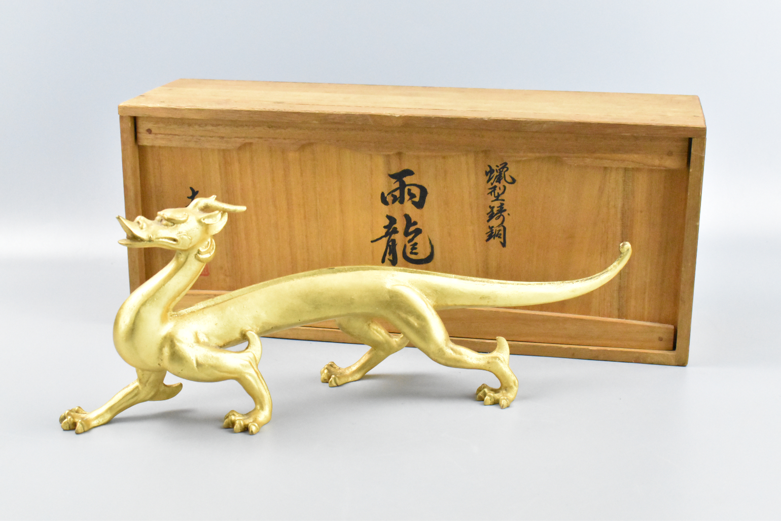 Appraisal: Japanese finely carved gilt bronze dragon was carved in traditional