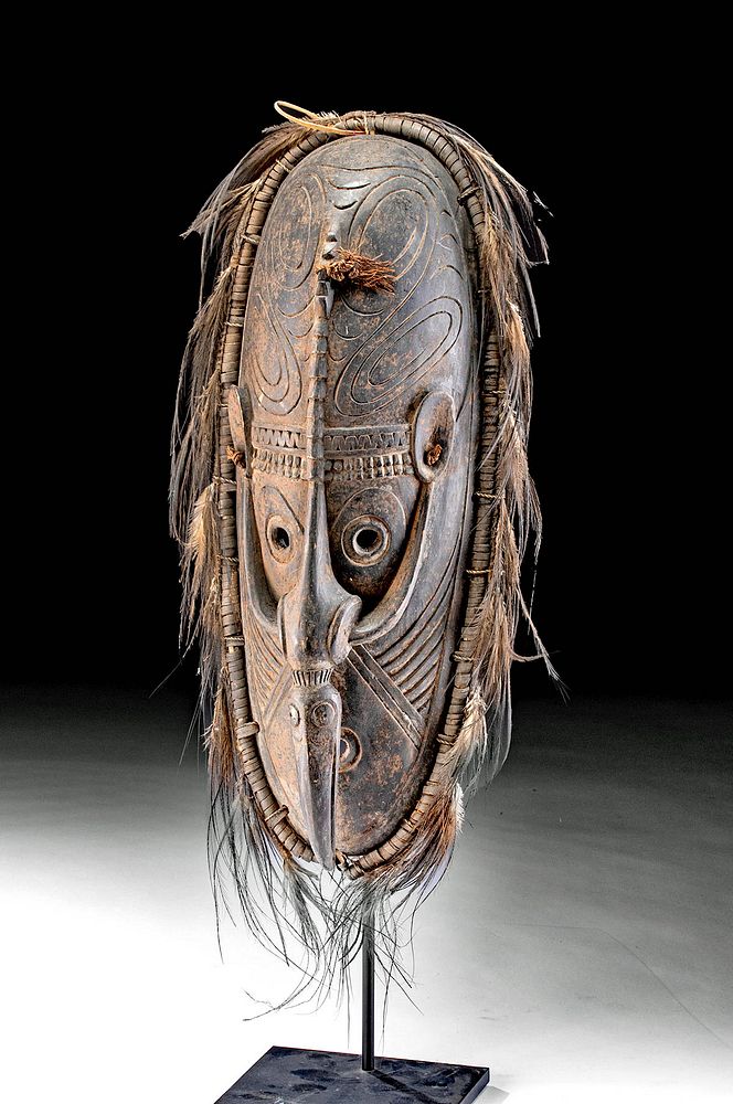 Appraisal: th C Papua New Guinean Wood Mask with Feathers Oceania