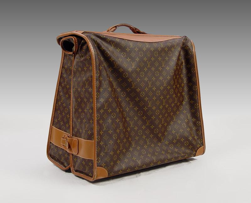 Appraisal: LOUIS VUITTON GARMENT BAG Classic logo decoration Folds to carry