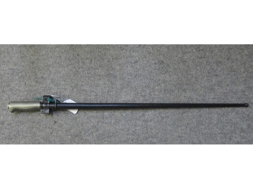 Appraisal: A French Epee bayonet with cruciform blade in scabbard