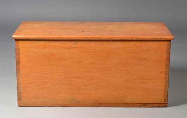 Appraisal: An American Pine Blanket ChestWith fine cut dovetails with hinged