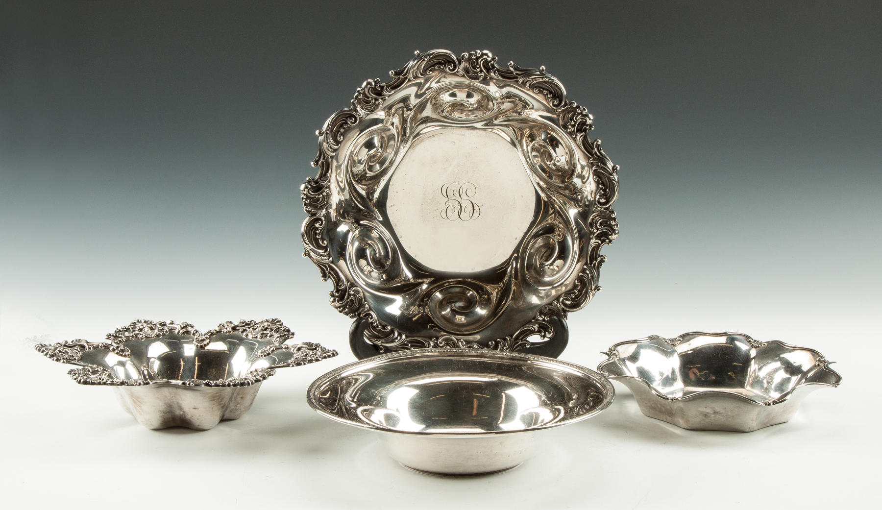 Appraisal: Four Sterling Silver Bowls All monogrammed Clockwise Unknown shell border