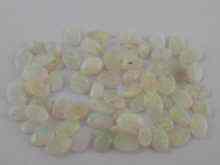 Appraisal: A quantity of loose polished opals each approx x mm