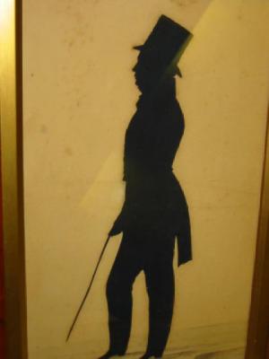 Appraisal: ENGLISH SCHOOL Silhouette Portrait of a Gentleman full length profile