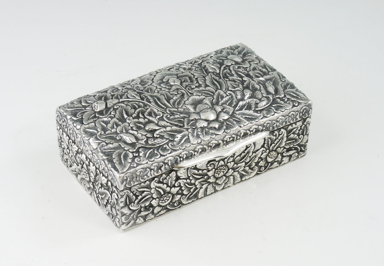 Appraisal: CONTINENTAL SILVER REPOUSSE BOX Repousse silver over wood with floral