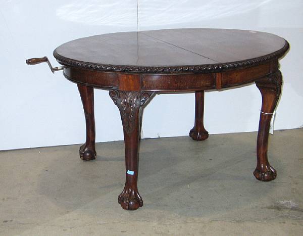 Appraisal: A George III style mahogany dining table last quarter th