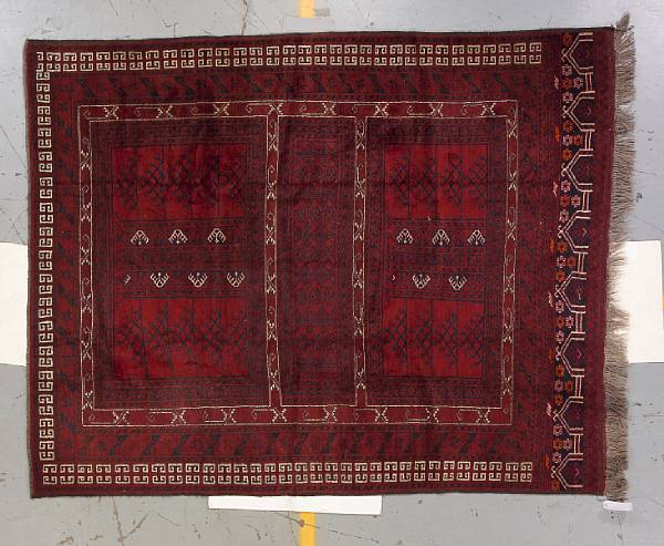 Appraisal: An Afghan rug size approximately ft in x ft in