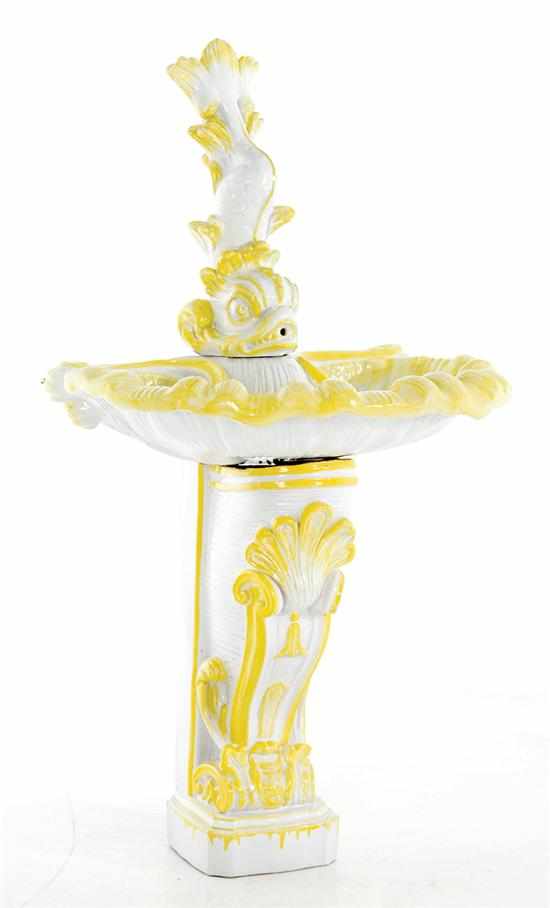 Appraisal: Majolica dolphin fountain dolphin cresting shell-shaped fountain upon pedestal with